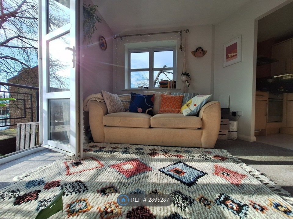 Property photo 2 of 28 Sunny Living Room