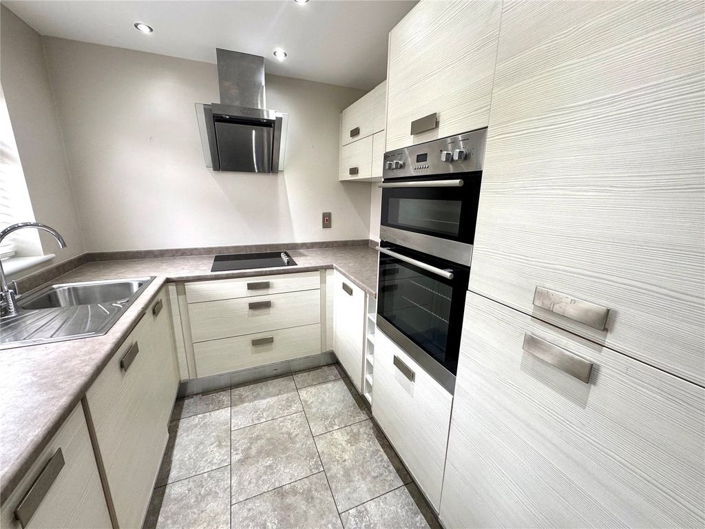 Property photo 3 of 12 Kitchen