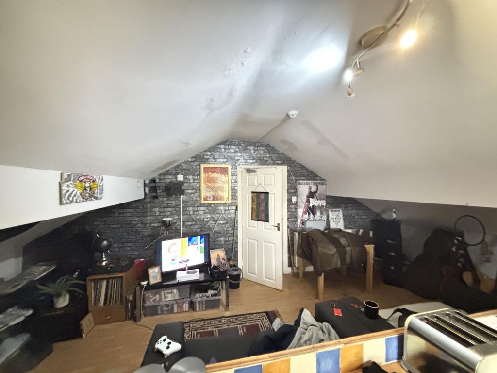 Property photo 3 of 7 A Spacious And Well-Lit Contemporary Living Room W...