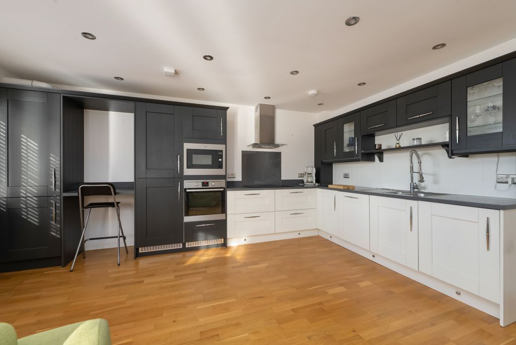 Property photo 3 of 13 Kitchen Area