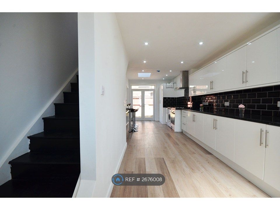 Property photo 3 of 11 Open-Plan Kitchen