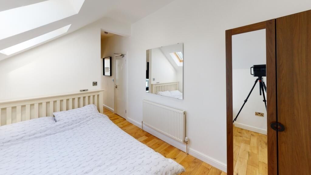 Property photo 1 of 8 Bright And Airy Master Bedroom Featuring A Double ...