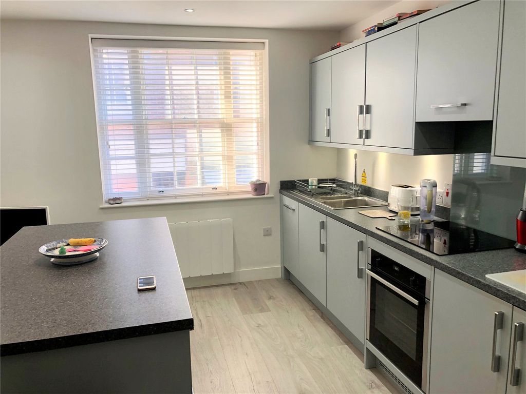 Property photo 3 of 8 Kitchen