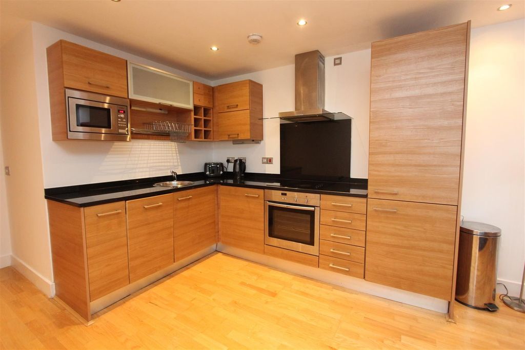 Property photo 2 of 11 Modern Fitted Kitchen With Sleek Appliances...