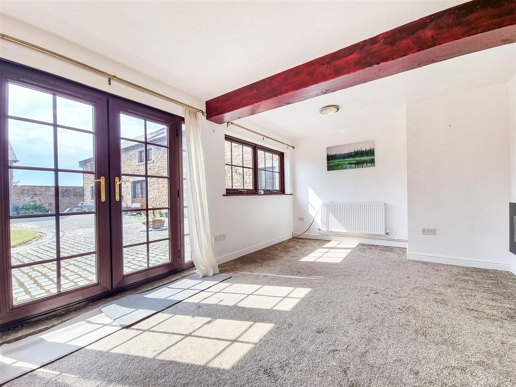 Property photo 2 of 13 Bright Living Area