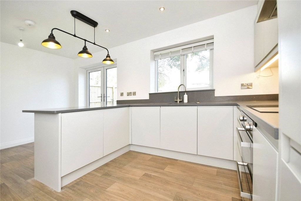 Property photo 2 of 8 Dining Kitchen