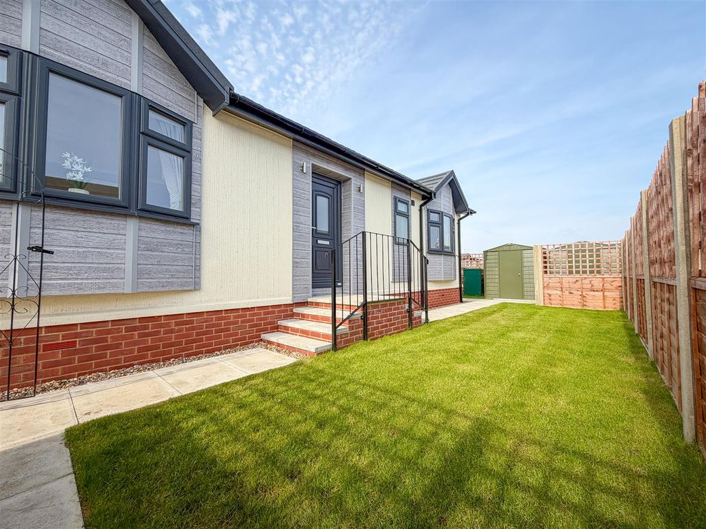 Property photo 2 of 24 Outside - Rear