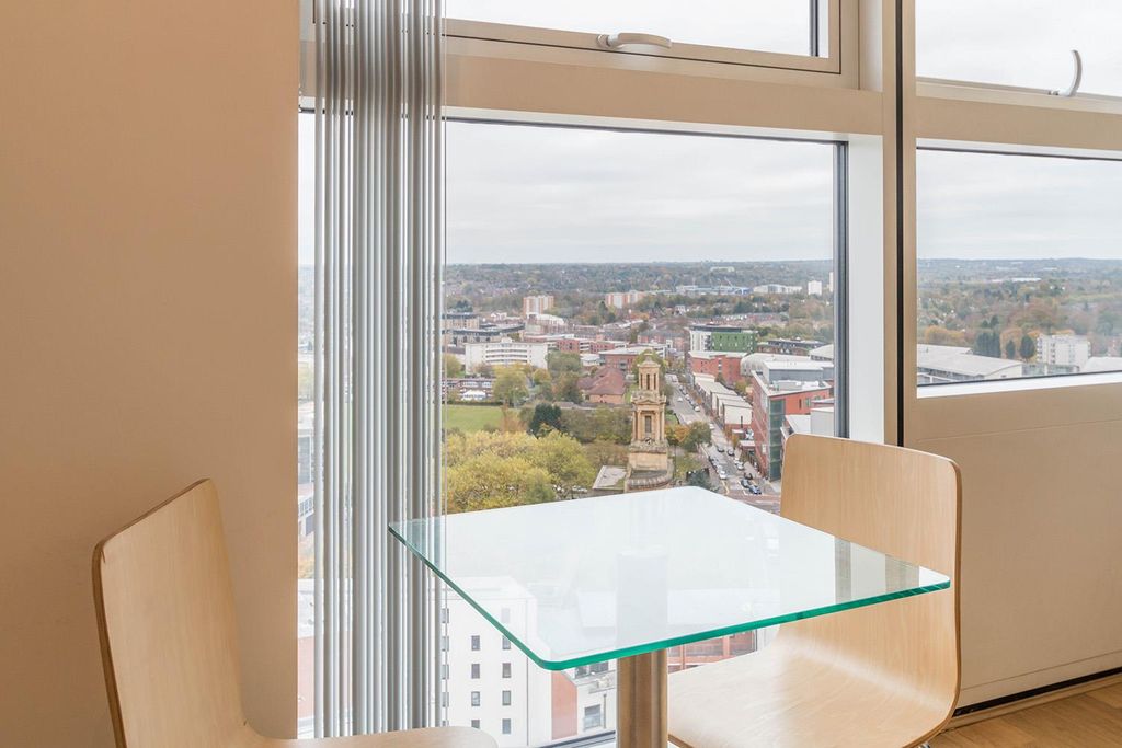 Property photo 3 of 12 Living Area