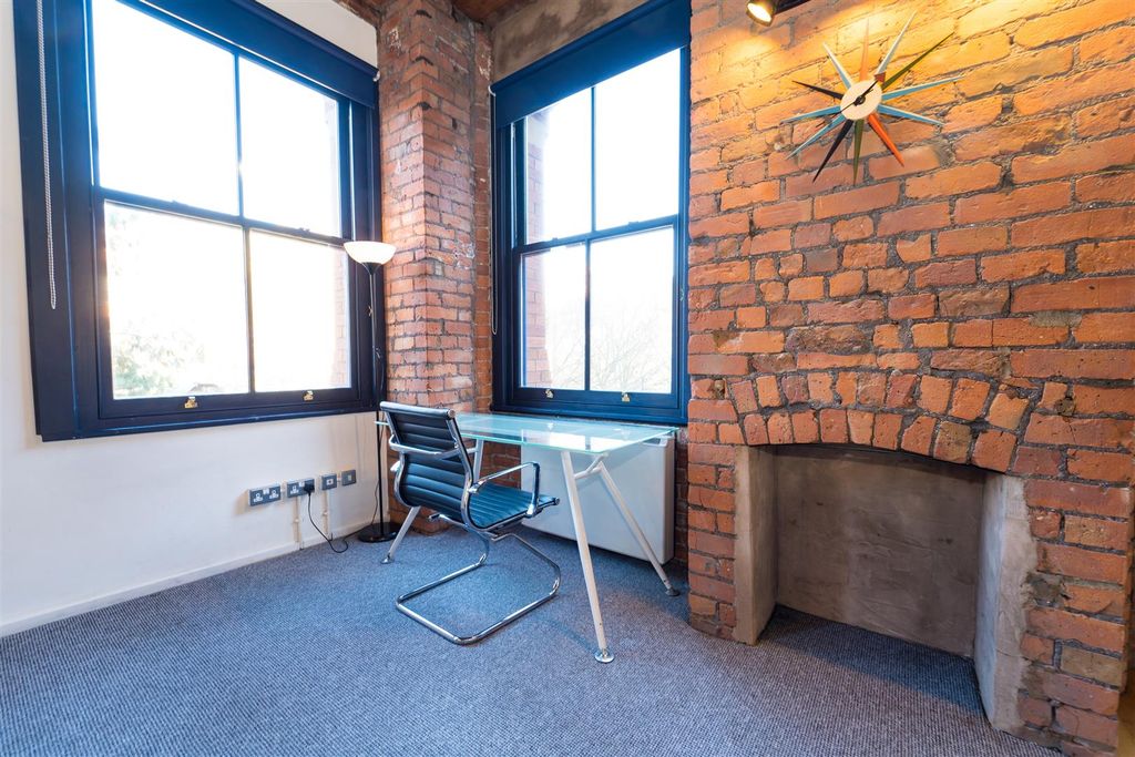 Property photo 3 of 18 Living Area