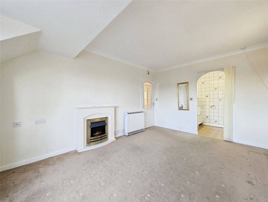 Property photo 3 of 12 Living Room