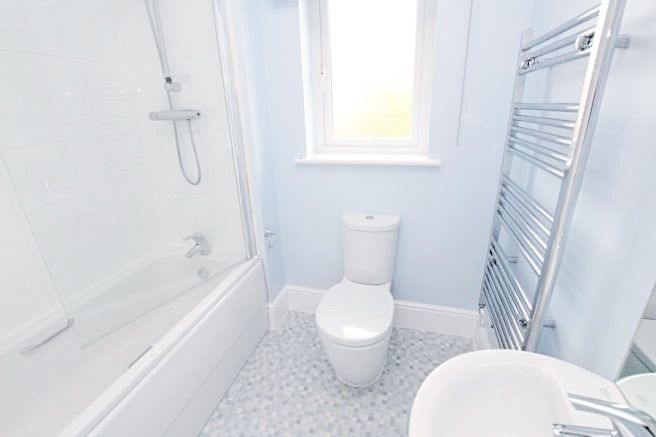 Property photo 3 of 13 Bright, Modern Bathroom With A Combined Bath And S...
