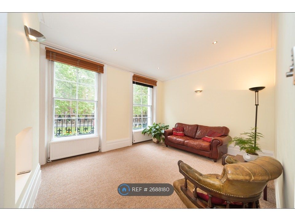 Property photo 3 of 12 Living Room Photo 1