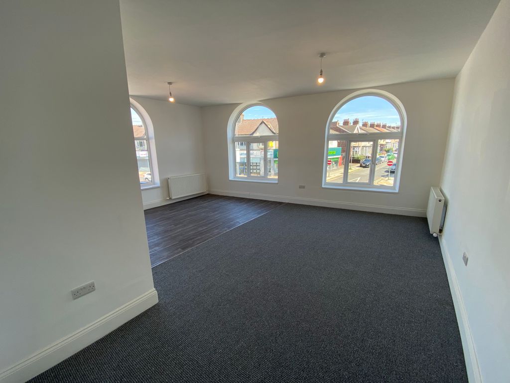 Property photo 1 of 8 Living Room