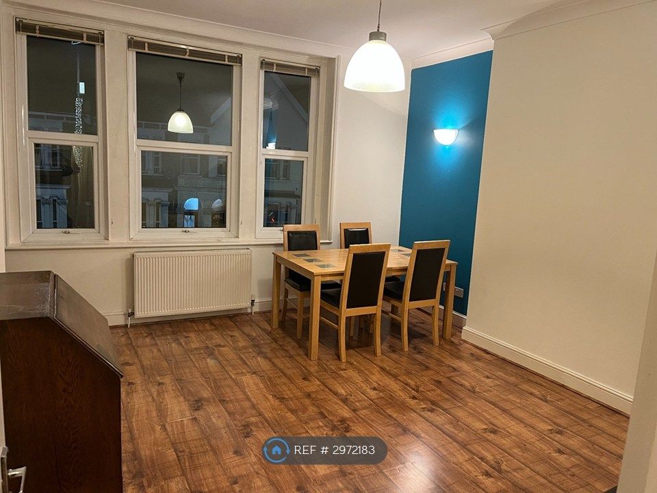 Property photo 3 of 8 Lounge/Dining Area