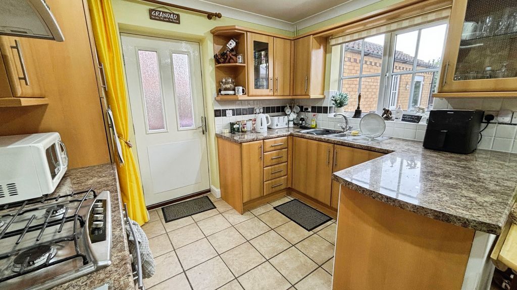 Property photo 2 of 12 Kitchen