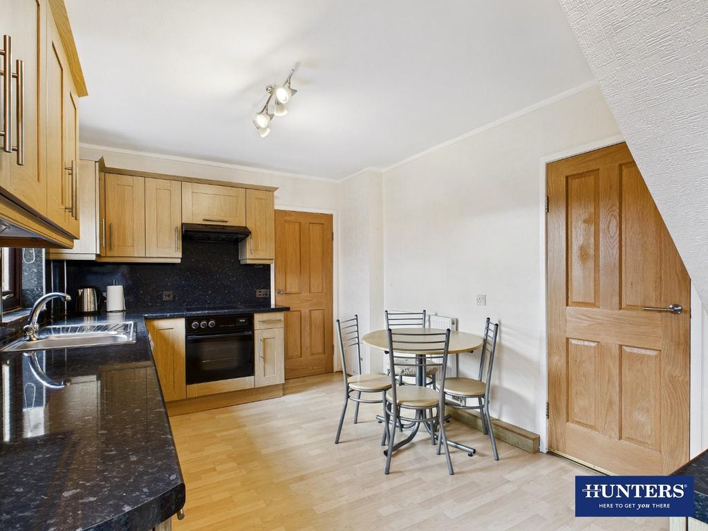 Property photo 3 of 13 Dining Kitchen