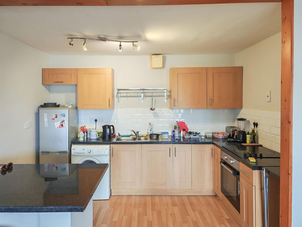 Property photo 3 of 12 Kitchen