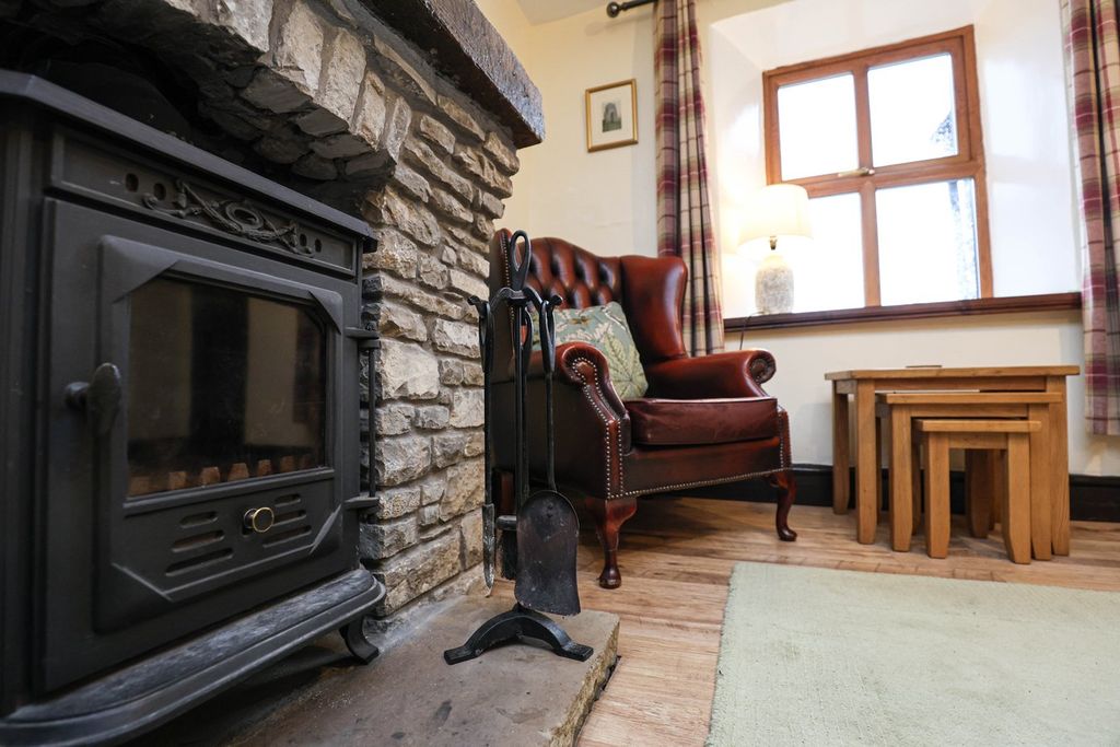 Property photo 2 of 13 Dining Lounge With Multi-Fuel Stove