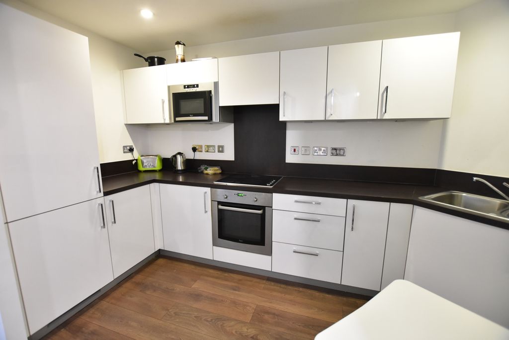 Property photo 3 of 8 Kitchen