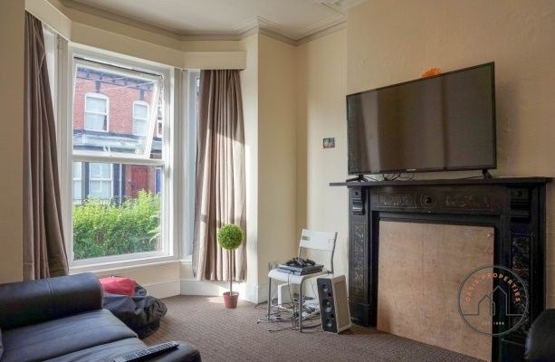 Property photo 2 of 9 A Bright And Modern Living Room With A Large Windo...