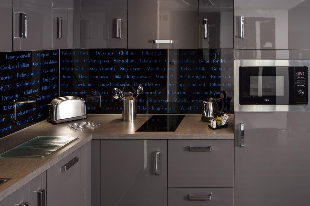 Property photo 2 of 7 Modern Fitted Kitchen With Sleek Grey Cabinetry, i...