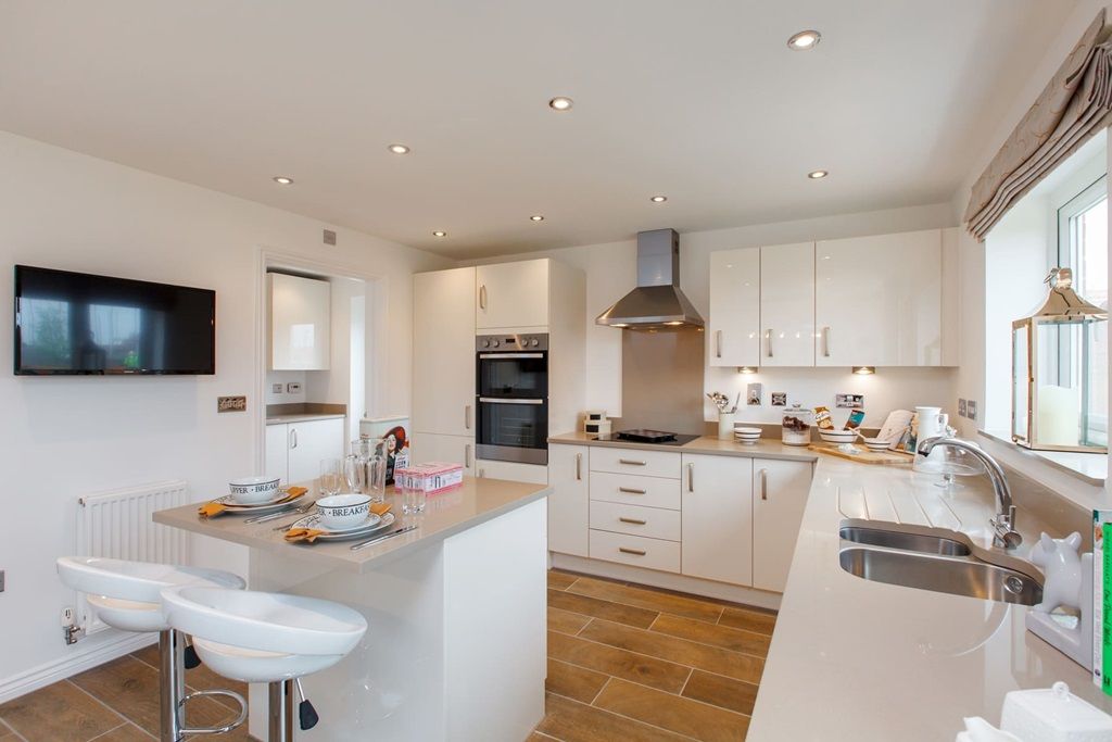Property photo 3 of 17 The Kitchen/Breakfast Area Features Double Doors Onto The Landscaped Rear Garden