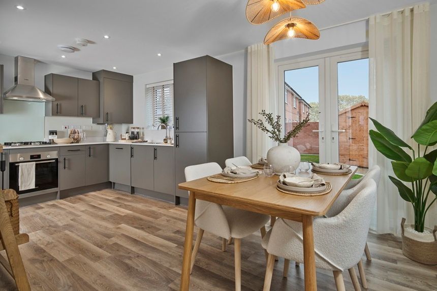 Property photo 2 of 11 Kitchen And Dining Area - 860 x 573