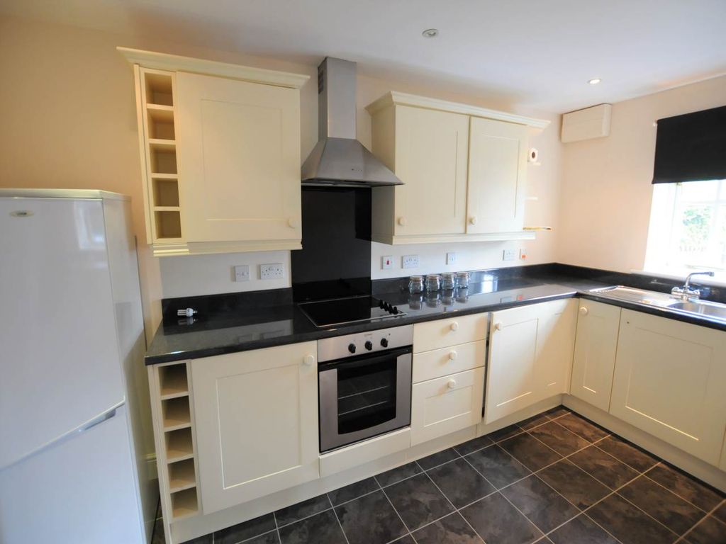 Property photo 3 of 4 Kitchen