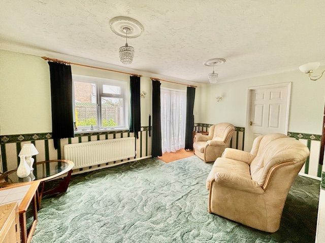 Property photo 3 of 16 Sitting Room