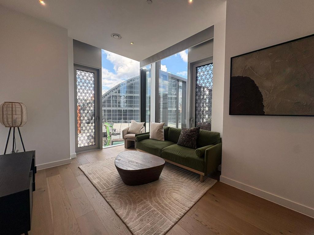 Property photo 1 of 12 Living Area