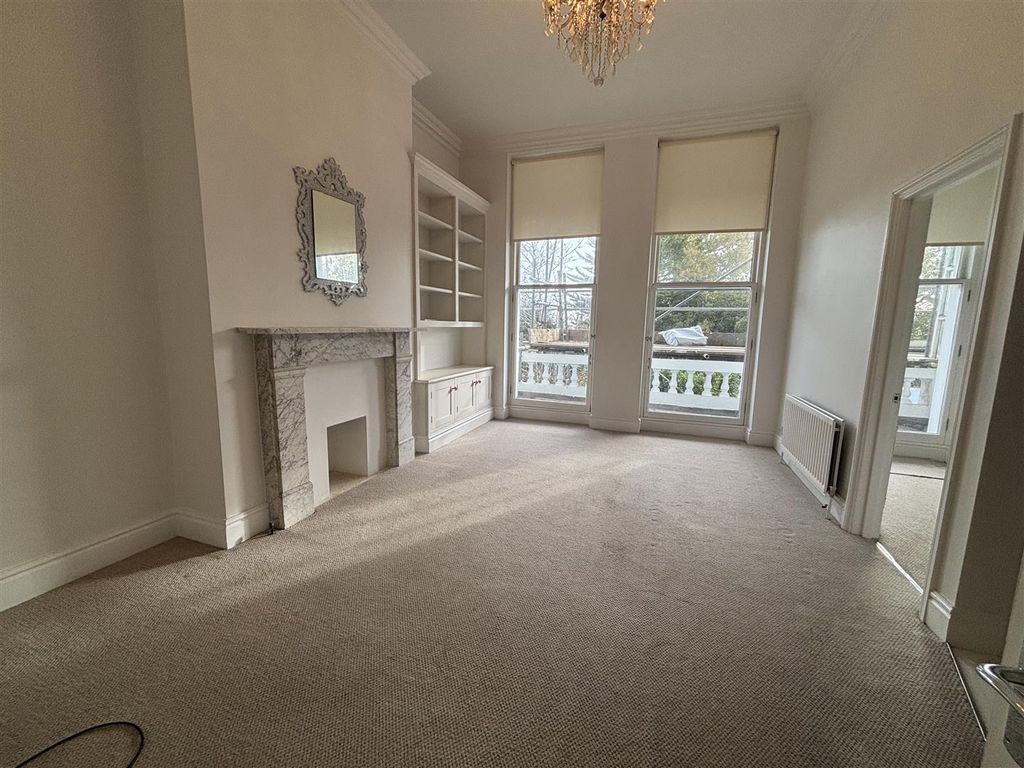 Property photo 2 of 9 Living Area