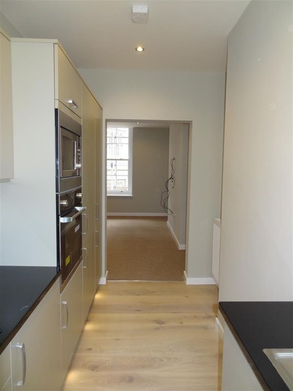 Property photo 3 of 8 Kitchen