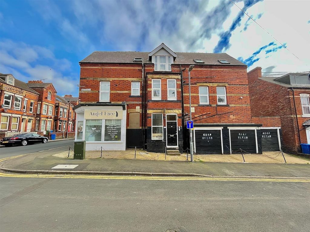 Property photo 1 of 12 Front Exterior