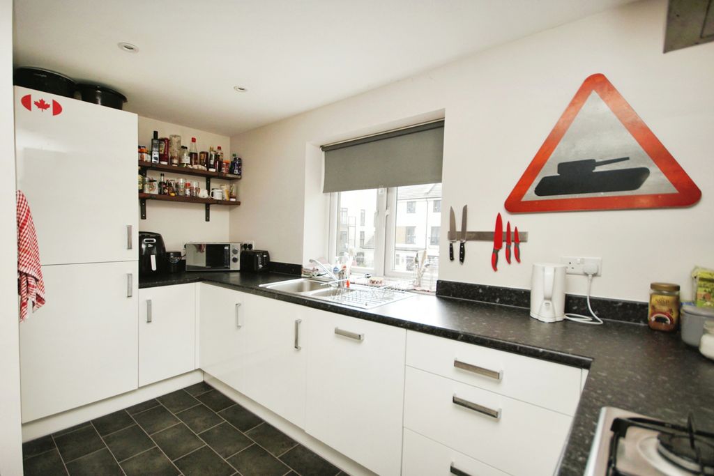 Property photo 3 of 16 Kitchen Area