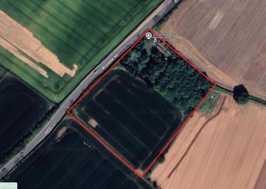 Property photo 1 of 33 Christmas House Sky View.Png