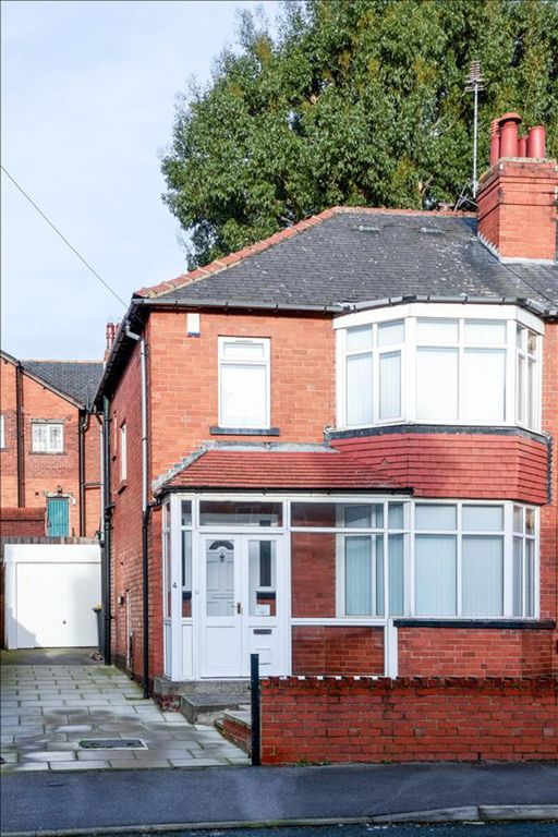 Property photo 3 of 19 This Charming Red-Brick Property Features A Welcom...