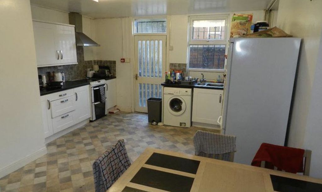 Property photo 1 of 6 Bright And Welcoming Living Room Featuring Natural...