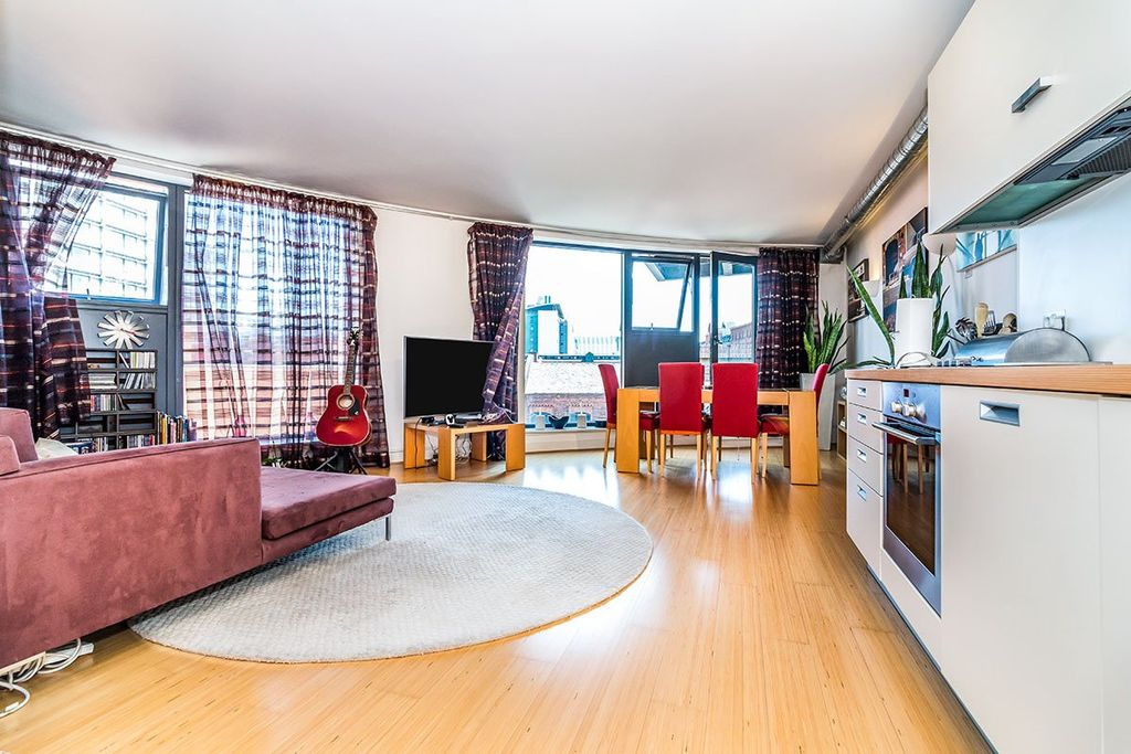 Property photo 1 of 12 Living Area