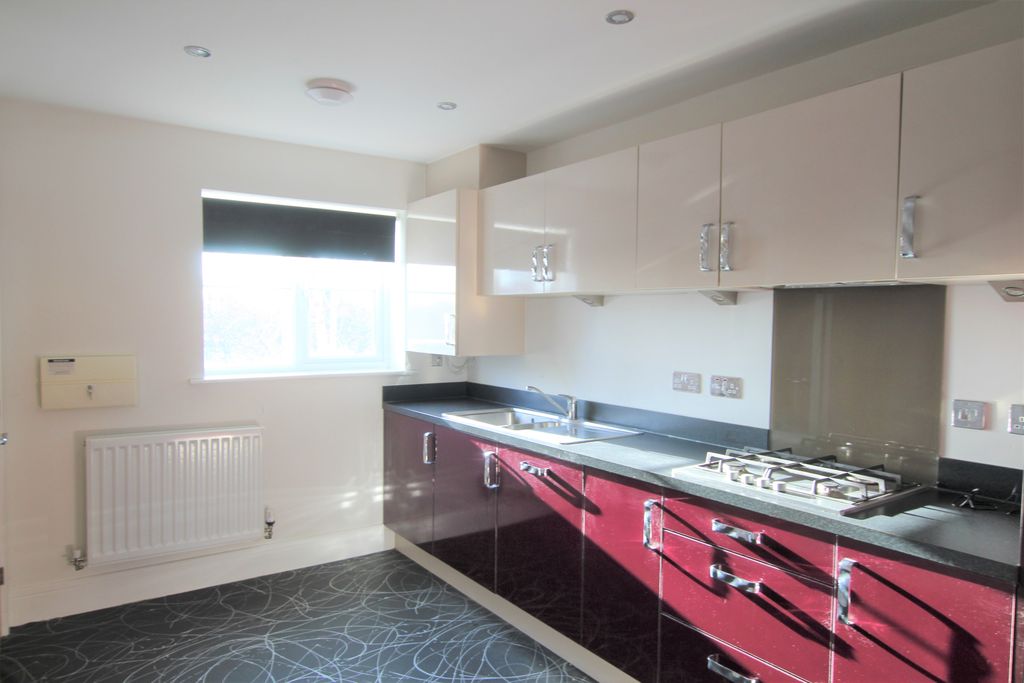 Property photo 3 of 12 Kitchen