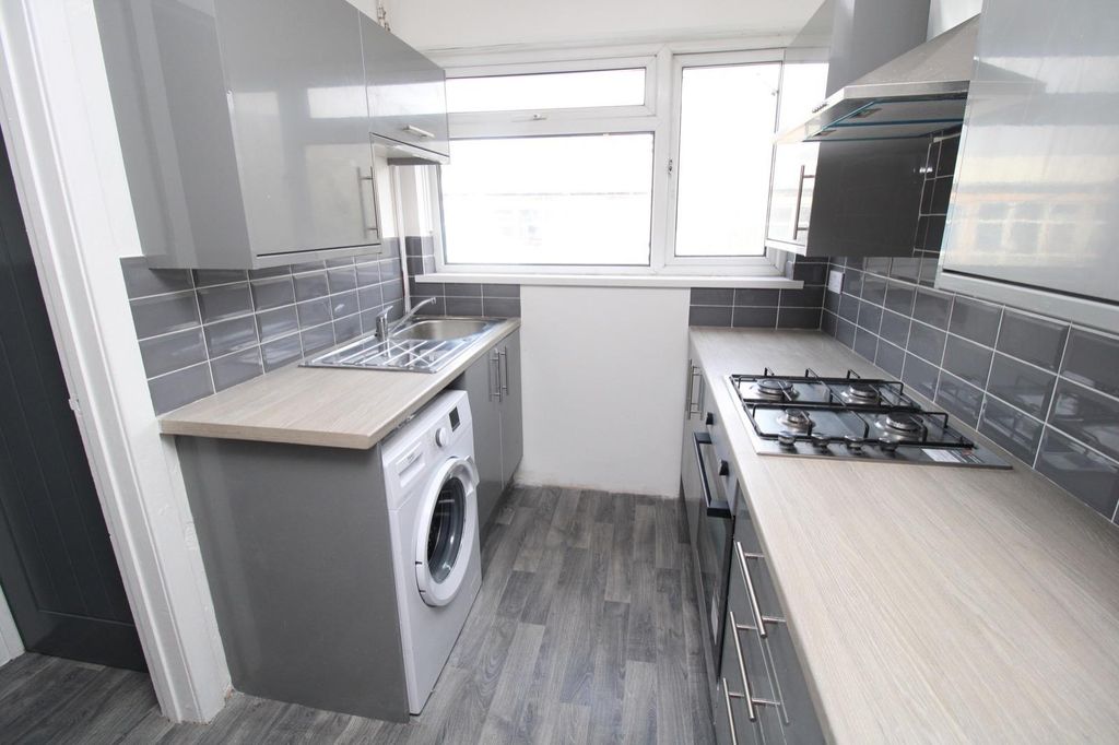 Property photo 2 of 4 Bright Modern Kitchen With Sleek Grey Tiling...