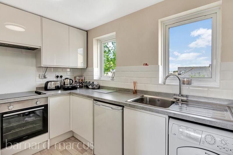 Property photo 3 of 8 Kitchen