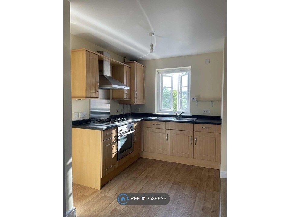 Property photo 3 of 8 Kitchen Area