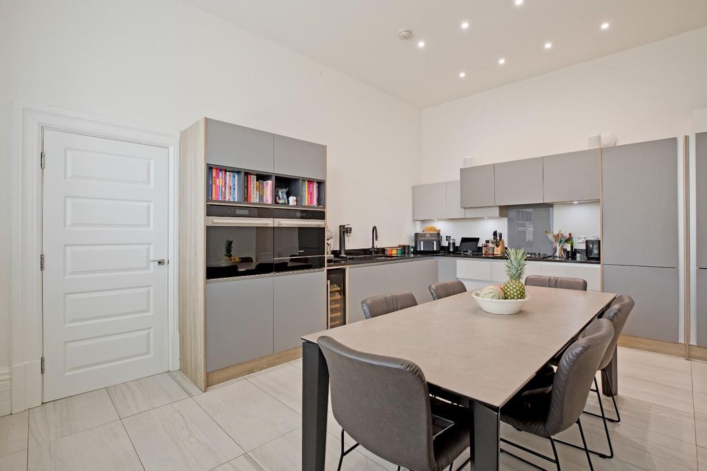 Property photo 2 of 32 Dining Kitchen