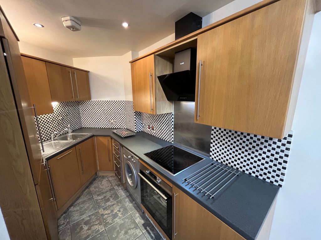 Property photo 3 of 9 Kitchen