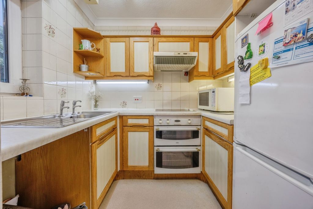 Property photo 3 of 12 Kitchen
