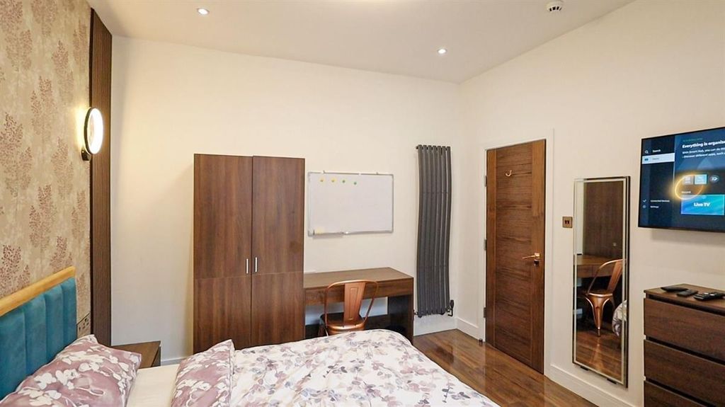 Property photo 3 of 15 A Bright And Inviting Master Bedroom Featuring A c...