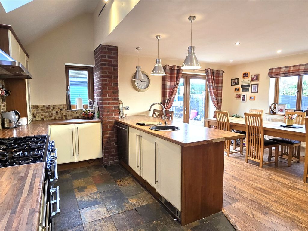 Property photo 2 of 27 Dining Kitchen