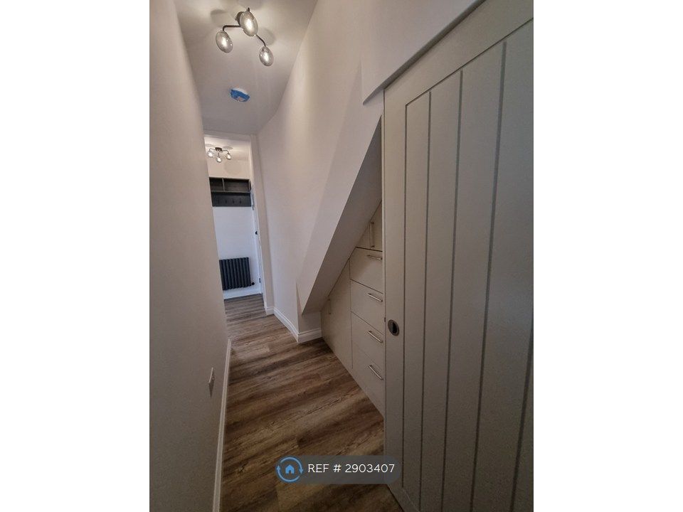 Property photo 2 of 14 Corridor/Storage Arrea
