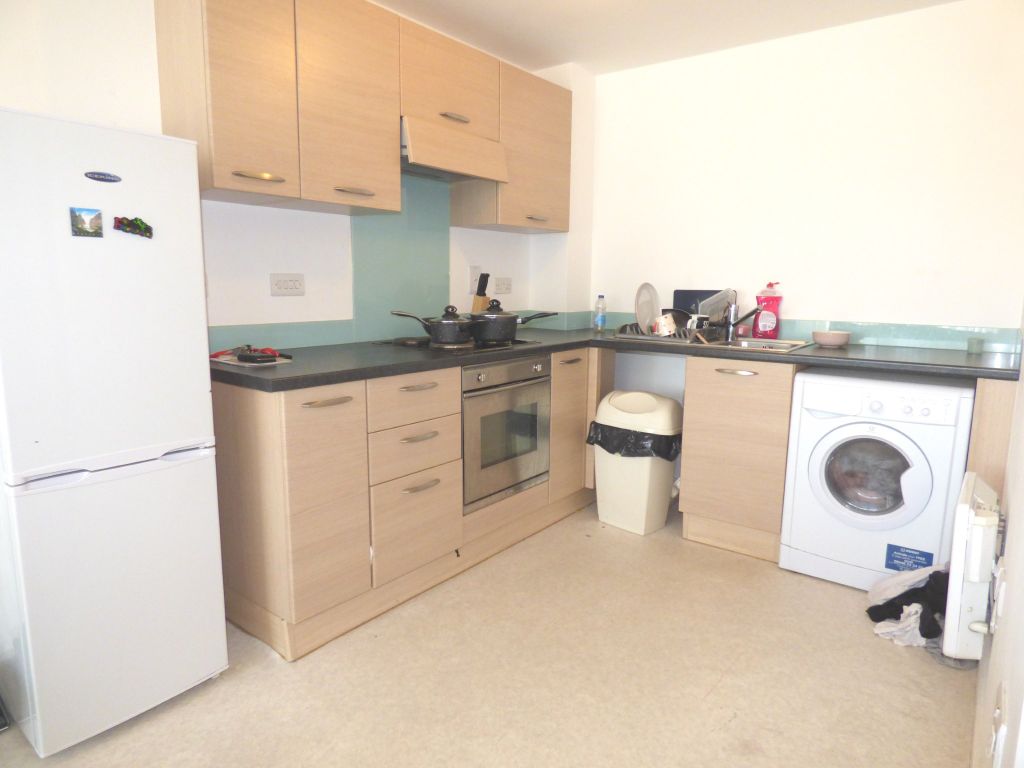 Property photo 3 of 8 Kitchen