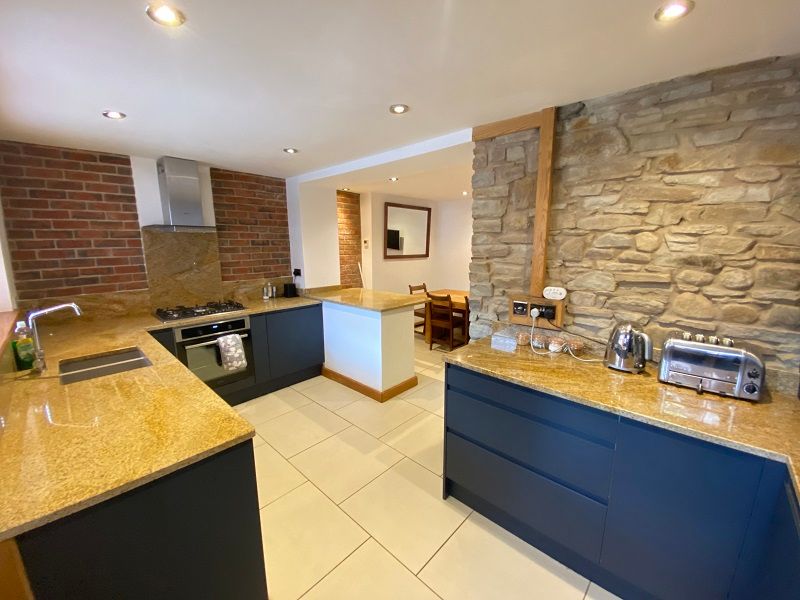 Property photo 3 of 12 Kitchen